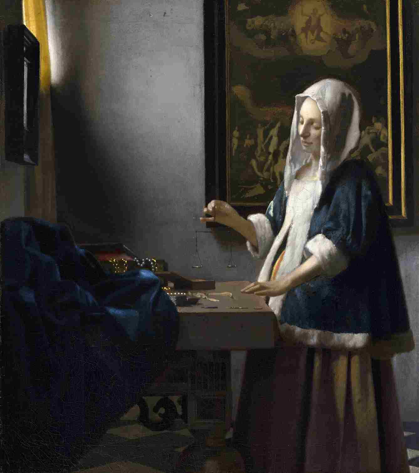 Johannes Vermeer Woman Holding a Balance (c 1664)-1